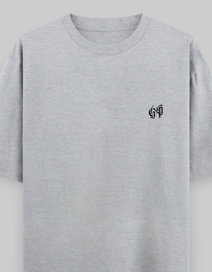 Grey oversized unisex t-shirt with small black graphic on chest, heavyweight cotton