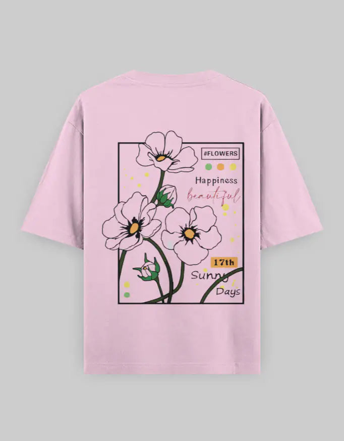 Light pink oversized unisex t-shirt with floral graphic and text on back