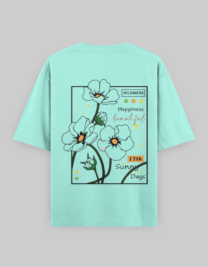 Mint green oversized t-shirt with graphic floral print, text and streetwear style design on back